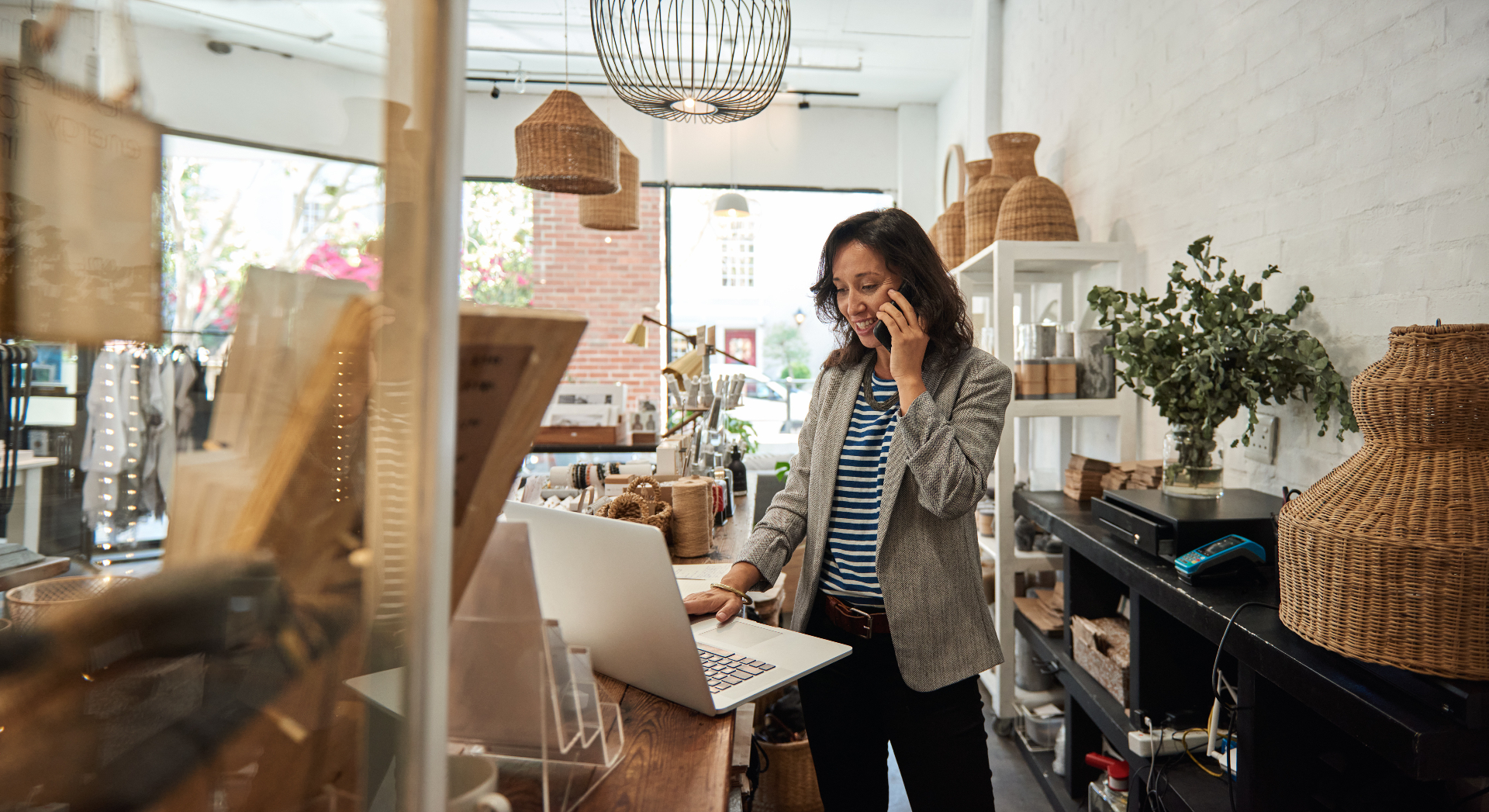 Small business owner managing her shop